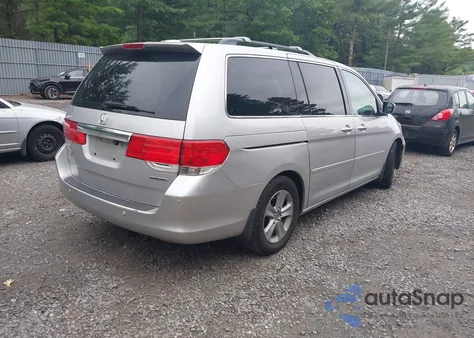 2010 Honda Odyssey Touring from USA, damaged, VIN 5FNRL3H9XAB090134
